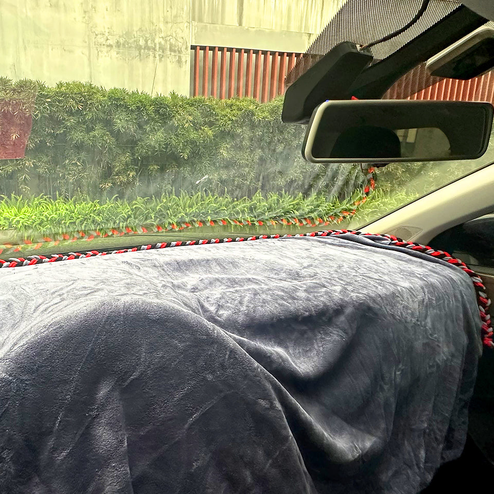 The Dash Protector in action on a car's dashboard, illustrating its effective protection during installation processes.
