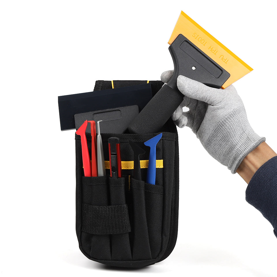 Professional packing tools into the ProStyle Tint & Wrap Utility Pouch Bag, showcasing its capacity and organizational efficiency for on-the-go use.