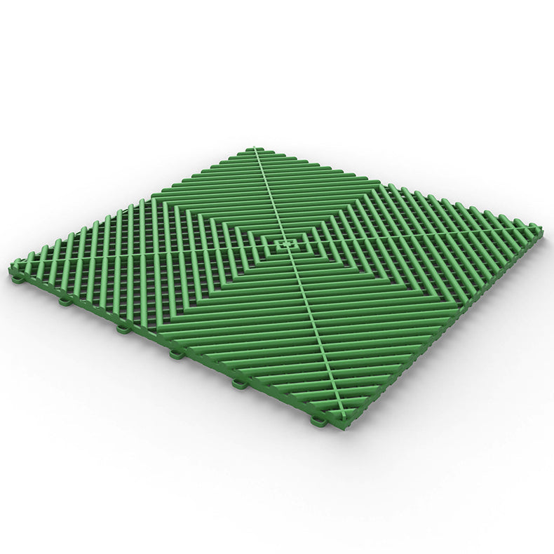 green GaraZilla garage plastic flooring, for a durable and clean space.