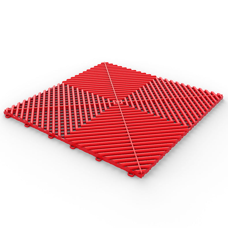 red GaraZilla garage flooring tiles, enhancing garage aesthetics with functionality.