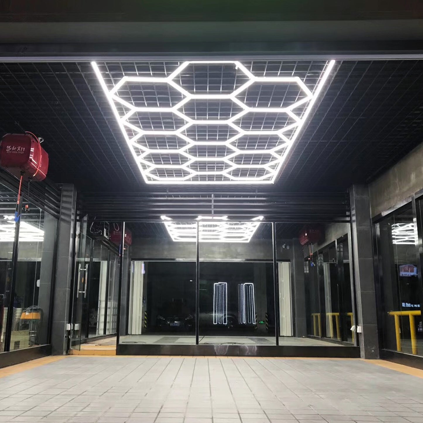 Illuminated garage featuring the stylish Vortex Hexa LED Light ST1028 in a sleek design