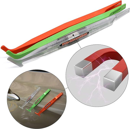 Two magnetic vinyl wrap sticks adhering to a car's surface, demonstrating their strong magnetic feature during application