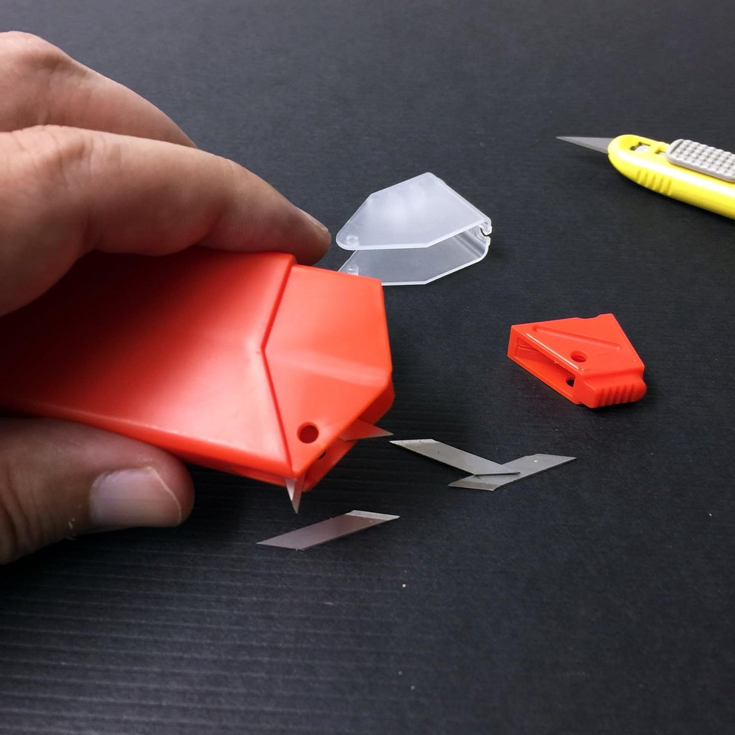 NT Cutter 9mm Snap-Off Precision Blade in use, showcasing its sharpness and precision.