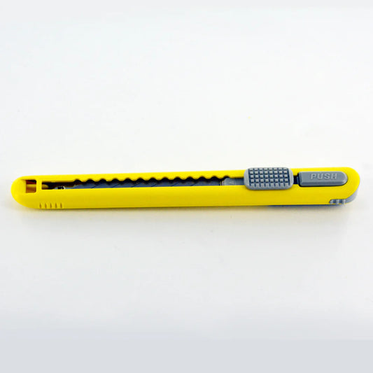 NT CUTTER A-553P Cartridge Knife showcased, highlighting its ergonomic design and blade storage feature.